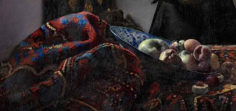 Carpet and bowl of fruits