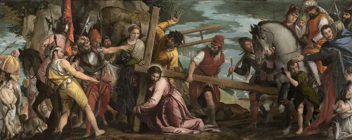 a numbers of figures surround Jesus Christ carrying the heavy cross