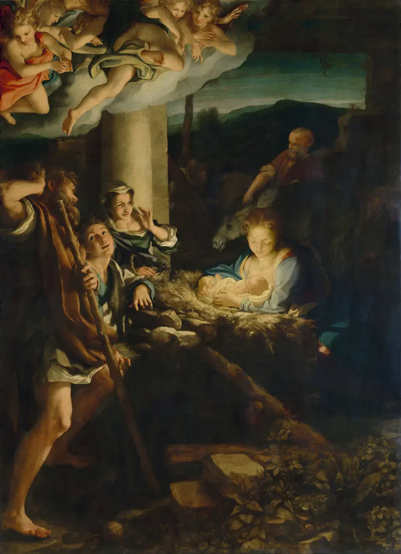 Eine Frau hält ein Baby im Arm in dunkler Umgebung