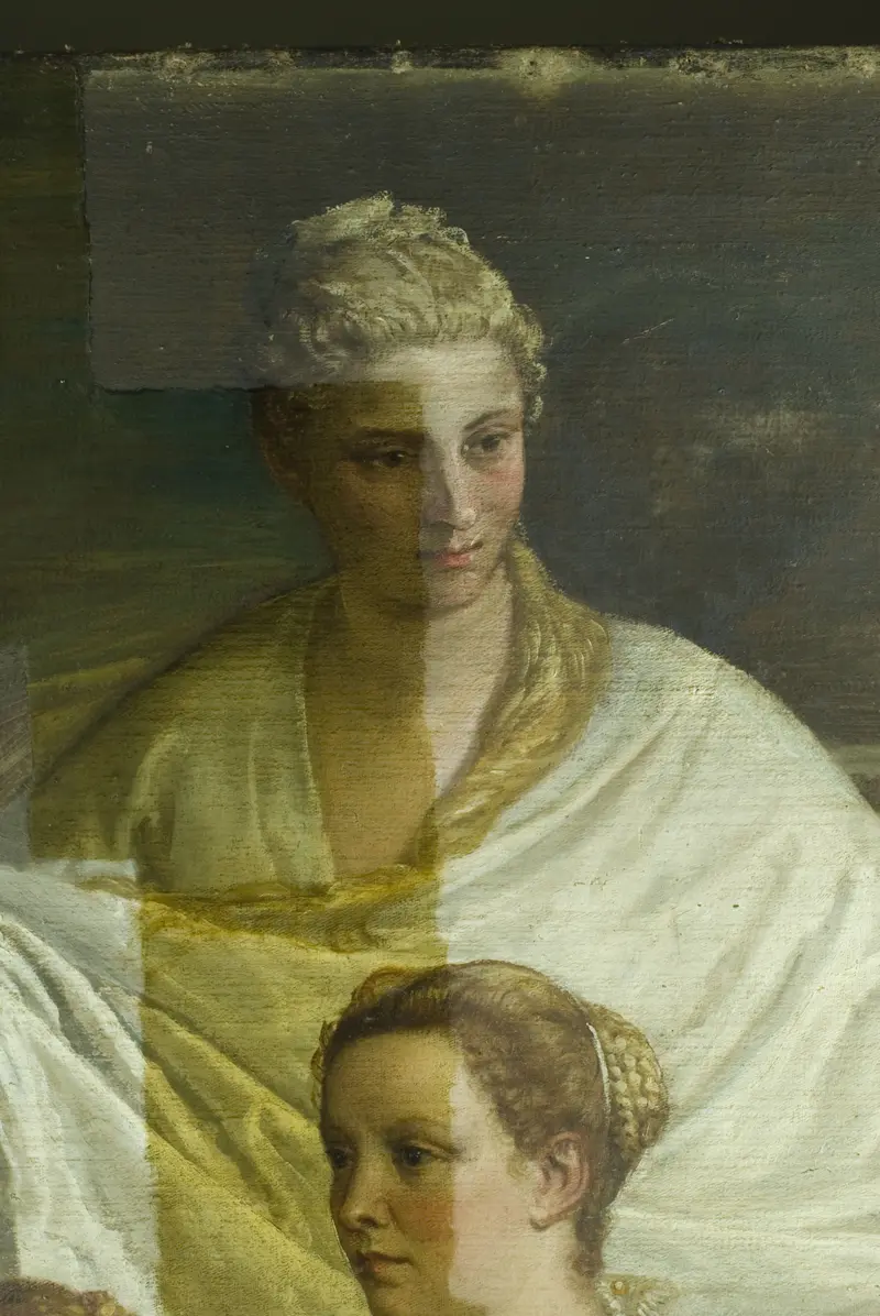 through the faces of two women runs a stripe of dark-yellow varnish 