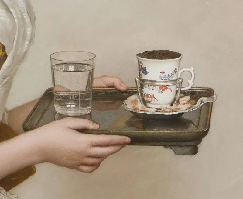 a girl carries a tray with a porcelain chocolate cup and a glass of water