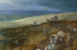 Hügelige Landschaft mit einer Gruppe an Menschen
