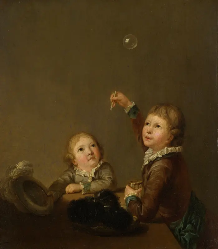 zwei Kinder und eine Seifenblase